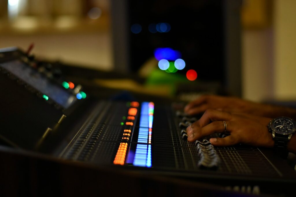 person playing black and white electric keyboard